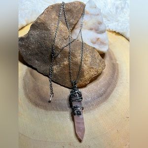 Rose quartz crystal point necklace with pewter cap wrap.